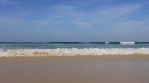 Waves, blue ocean, surf and beach Stock Footage 124999661