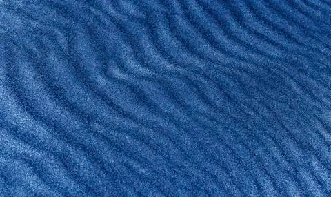 Waves of blue sand Foto stock