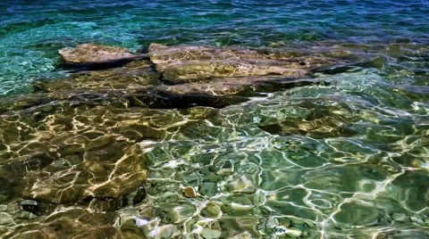 Waves on the blue sea with rock Stock Footage 66908852