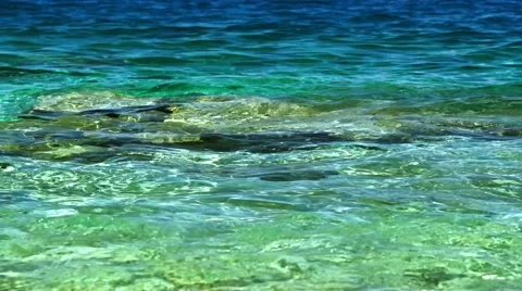 Waves on the blue sea with rock Stock Footage 66908854