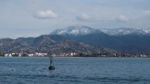 The waves of the blue strait shake the float Stock Footage 139409096