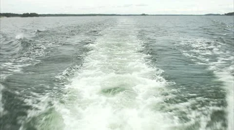 Waves from a boat Stock Footage 11311173