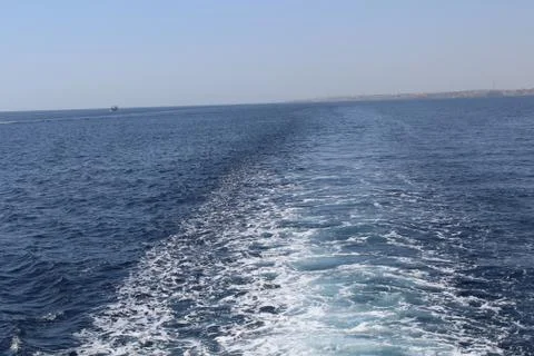 Waves from a boat Stock Photos