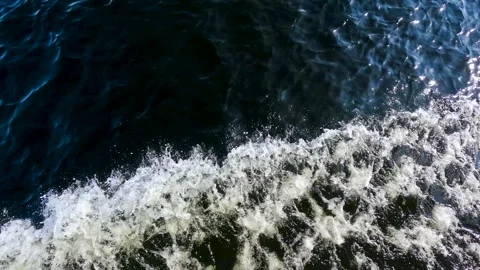 Waves from a boat sailing on a cold winter river Stock Footage 306548446