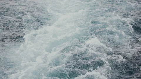 Waves from a boat on the surface of the lake Stock Footage 284629637