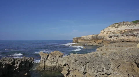 Waves break about rocks, the Atlantic Ocean at the coast of Portugal Stock Footage 50905273