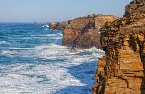 Waves break about rocks, the atlantic ocean at the coast of portugal Fotos Stock