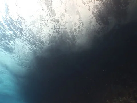 Waves break above Stock Footage 98503219