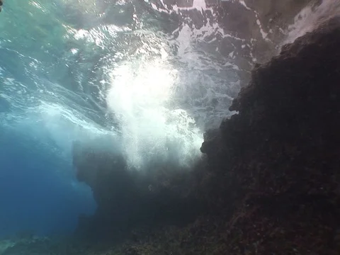 Waves break above Stock Footage 98503592