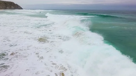 Waves break on the Atlantic shore Stock Footage 76839762