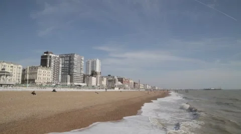 Waves break on Brighton Beach Town Seafront | HD 1080 Stock Footage 47717363