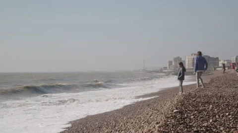 Waves break on Brighton Beach Town Seafront | HD 1080 Stock Footage 47717529