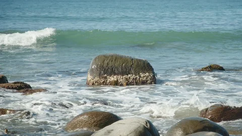 Waves break Over Rocks - Homunga Bay, New Zealand Stock Footage 130096118