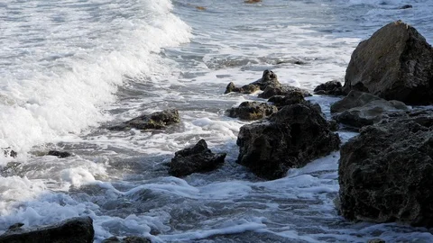 Waves break on the shore. Waves break on the rocks. Stock Footage 119787166