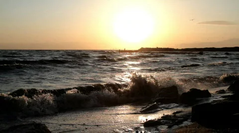 Waves Break at Sunset 库存影片 649849