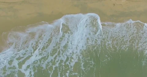 Waves break on tropical sand beach Stock Footage 142763315