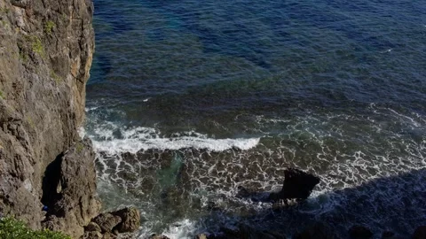 Waves Breaking Against Cliffs at Cape Hedo, Japan. Stock Footage 258331082