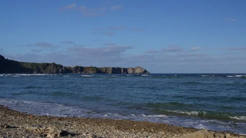 Waves Breaking Against Cliffs at Cape Hedo, Japan. Stock Footage 258331125