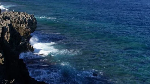 Waves Breaking Against the Rocks at Cape Hedo, Japan. Stock Footage 258331425