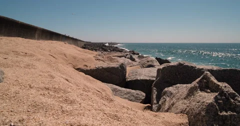 Waves breaking against sea wall in Povoa de Varzim, Portugal Video stock 131110004