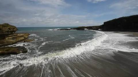 Waves breaking and surging up the beach, Punakaiki, New Zealand. Stock Footage 146989955