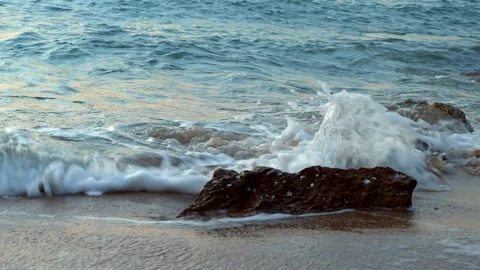 Waves Breaking Around Coastal Rocks at Sandy Shore Stock Footage 341652619