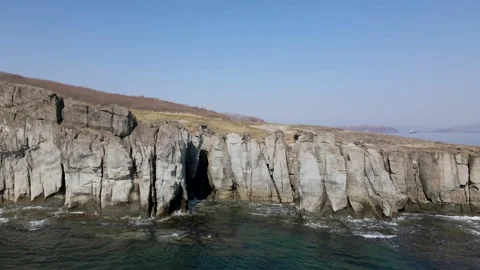 Waves Breaking on Basalt Columns Stock-Footage 316804176