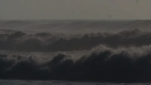 Waves breaking on the beach Video stock 105316550