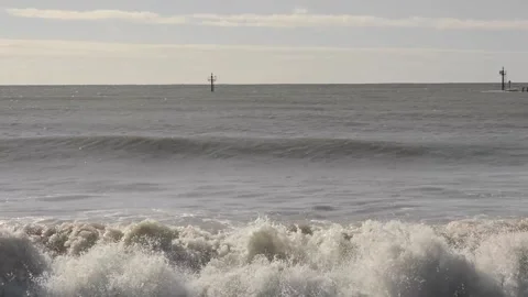 Waves breaking on beach Video stock 165389119