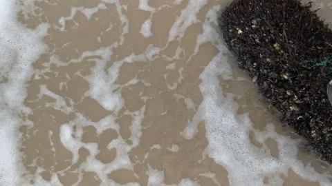 Waves breaking on the beach Stock Footage 283348466