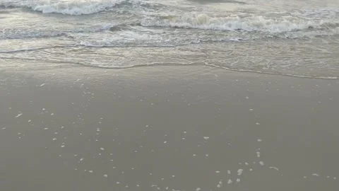 Waves breaking on the beach Stock Footage 283373847