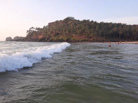 Waves breaking on the beach, goa  beach, waves on the beach. Stock Photos