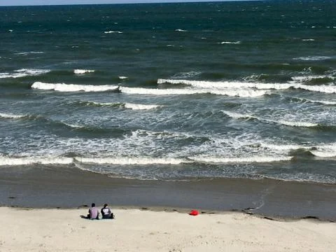 Waves breaking on beach Stock Photos