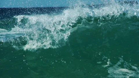 Waves breaking on beach in slow motion Stock Footage 104268744