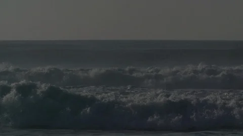 Waves breaking on the beach - Slow motion Stock Footage 105344050