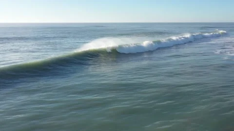 Waves breaking on the beach of a Spanish Atlantic beach Stock Footage 164954231