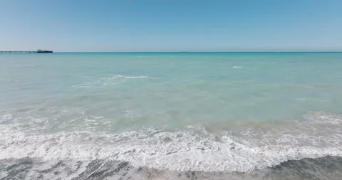 Waves breaking on beautiful sandy beach. Tropical island Stock Footage 191708578