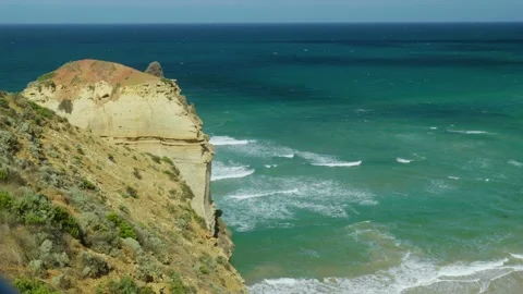 Waves Breaking Below Cliff Edge Stock Footage 303021159