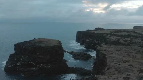 Waves breaking on the black rock cliff of western Icelandic coast, Snaefellsnes Stock Footage 98261791