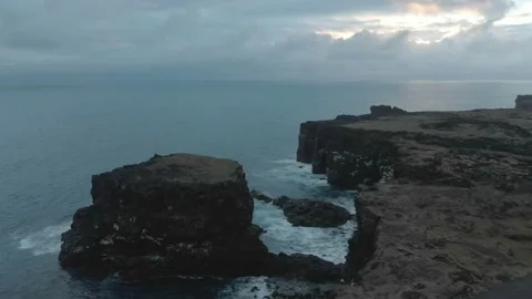 Waves breaking on the black rock cliff of western Icelandic coast, Snaefellsnes Stock Footage 98263155