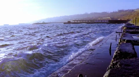Waves Breaking on the Breakwater Stock Footage 58831525