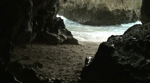 Waves Breaking into a cave Stock Footage 308349