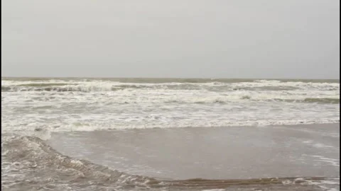 Waves breaking on the coast in a day with the calm sea. Stock Footage 146671913