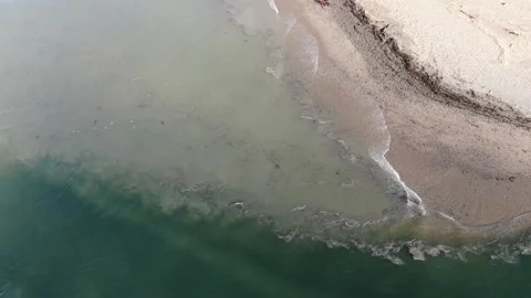 Waves breaking on coast Stock Footage 154682425