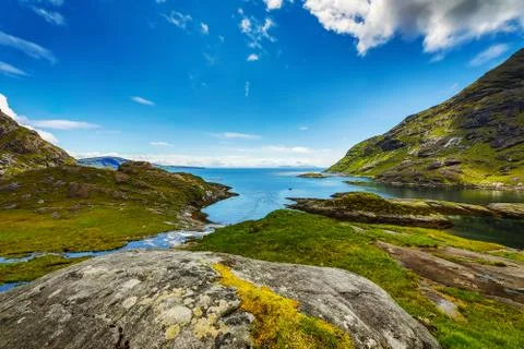 Waves breaking on coastal cliffs of Scotland. Stock Photos