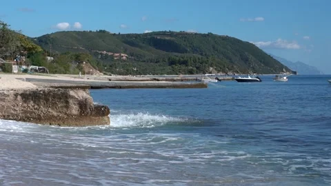 Waves Breaking on Concrete Block at Beach in Greece. Slow Motion Waves Stock Footage 197441336
