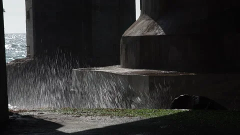 Waves breaking on a dock Stock-Footage 137136375