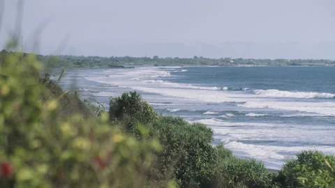 Waves breaking on an exotic beach in Bali, Indonesia Stock Footage 167847840