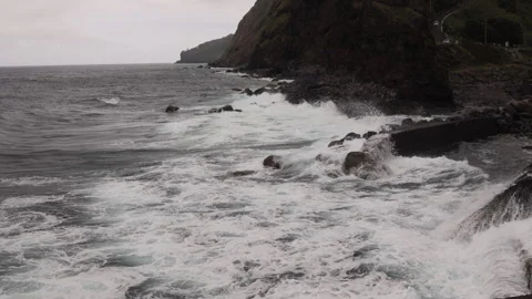 Waves Breaking in Front of Green Mountains. 4K60. Lomba da Fazenda,Sao Miguel. Stock Footage 240433483