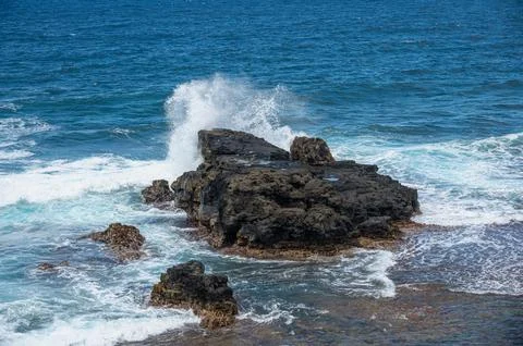 Waves breaking on Gris Gris Beach, Souillac, Mauritius Photos